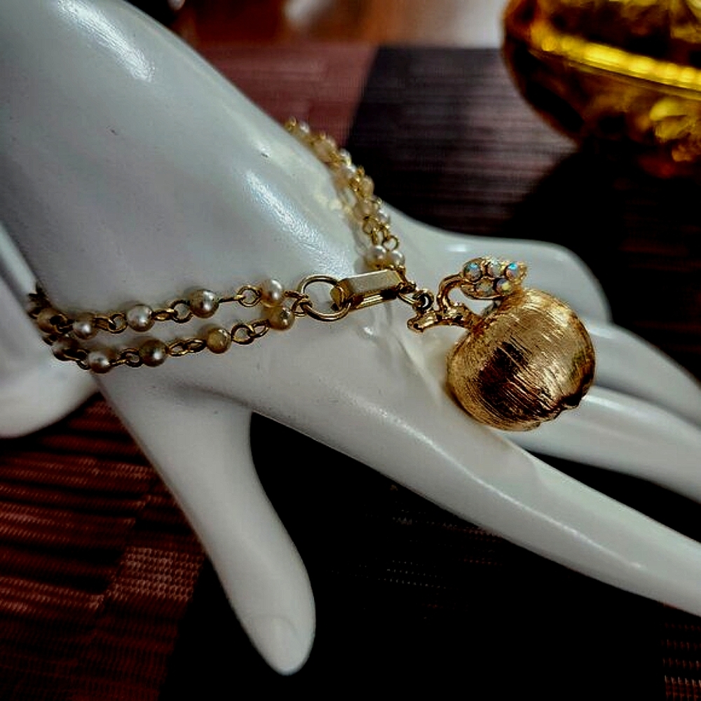 Apple Pendant on Dua Strand Faux Pearl  Gold Toned & Rhinstone Bracelet
